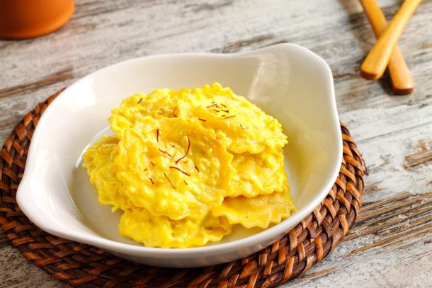 Ravioli in crema di fiori di zucca e zafferano